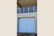 28/35 - Lock up garage which also has 2 beach chairs and umbrella