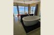 3/54 - WEDDING BED 1 WITH BATH LOOKING OUT TO SEA