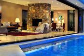 7/7 - Guest lounge and pool at dusk